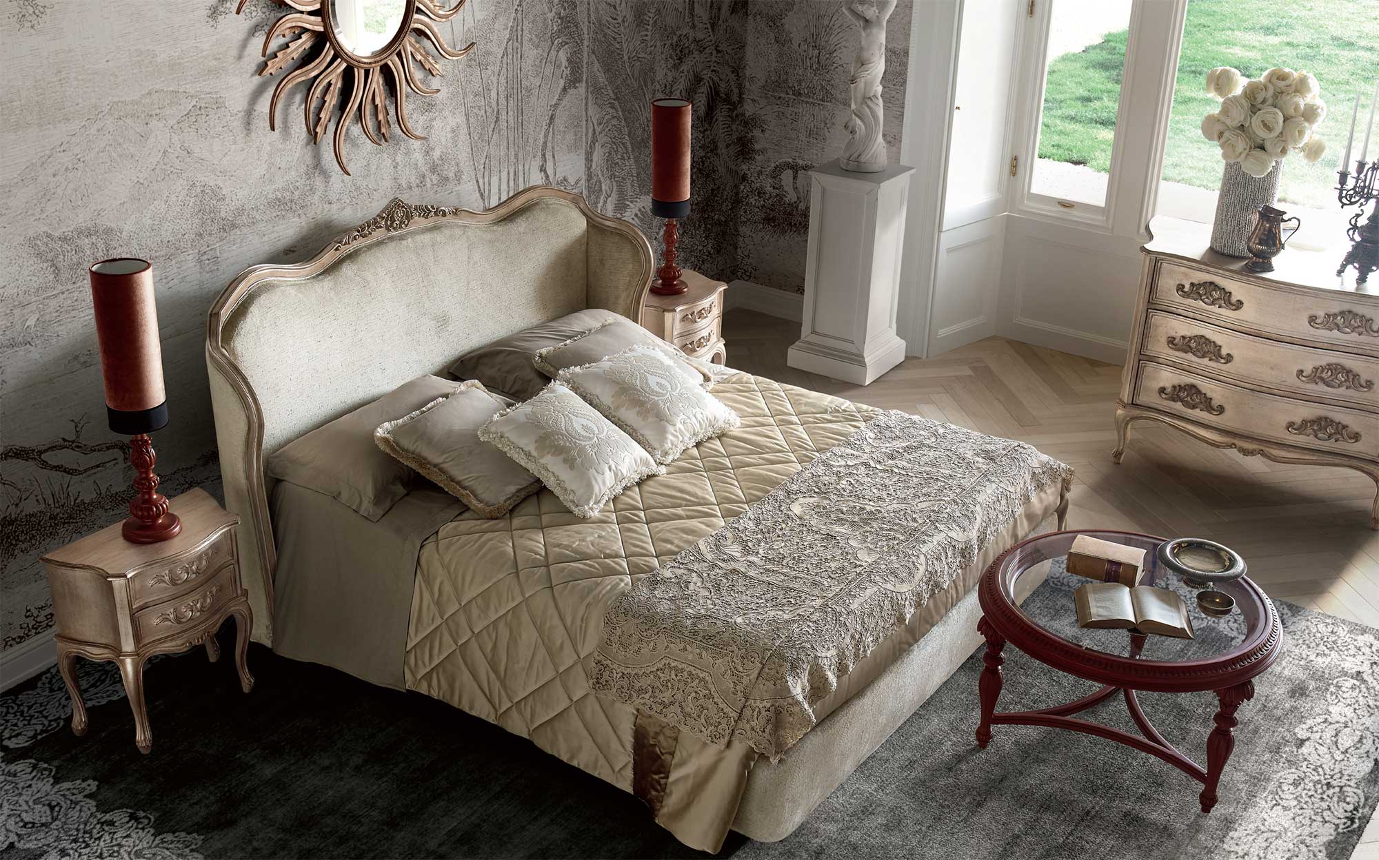 Classic bedroom with upholstered headboard, carved nightstands and curved dresser