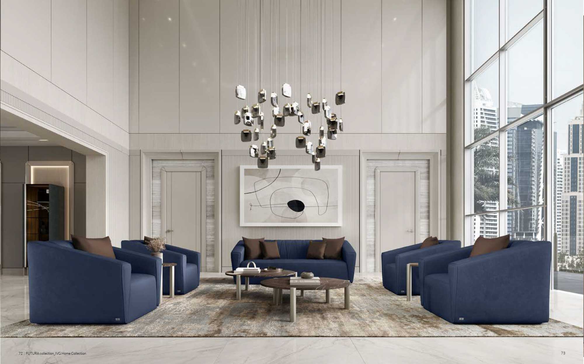 Furnishings for modern-style formal living areas | 101DOMUS Elegant living room with blue armchairs and sofa, round wood and metal coffee tables, high ceiling and sculptural chandelier